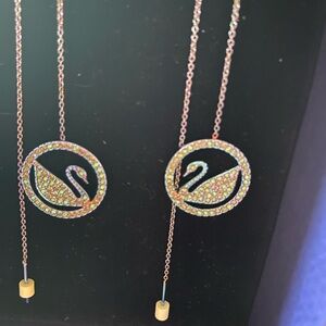 Swarovski Elegant Gold and Silver Swan Earrings